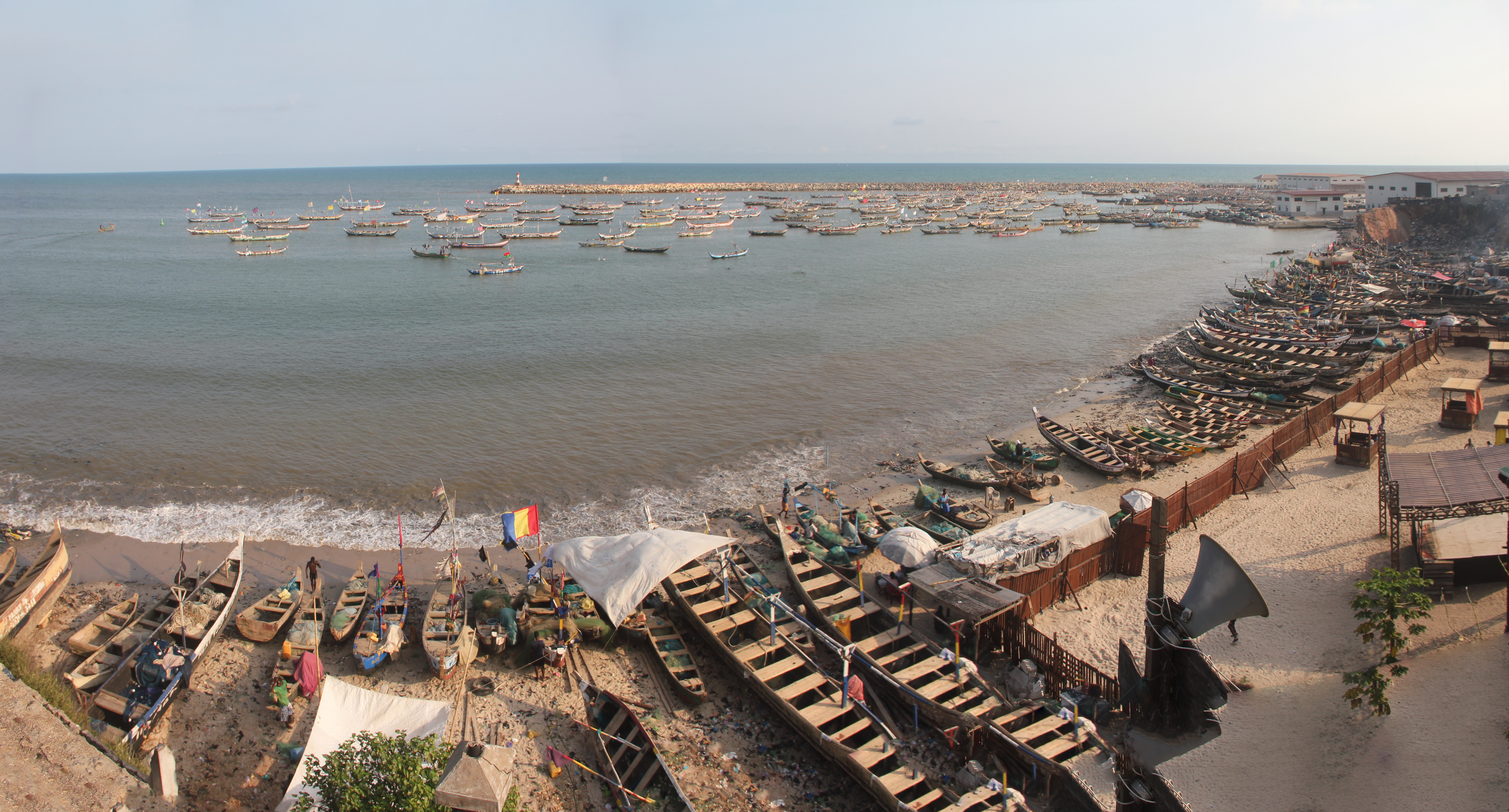 Stitched wide-angle panorama of the Jamestown fishing harbour in Accra, seen from the Fort Visao and Ussher Fort area